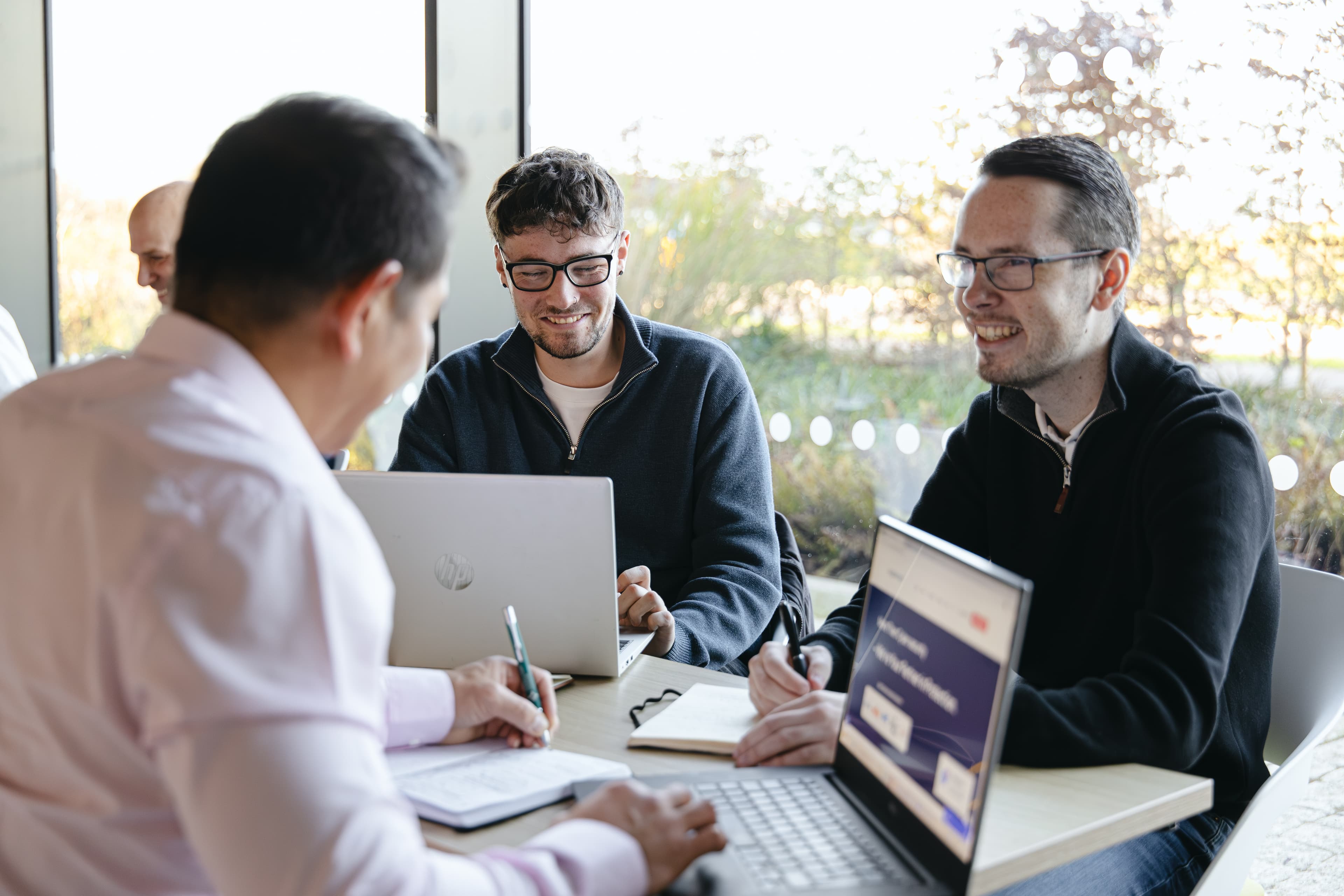 Cyber Trust team reviewing vulnerability scan results